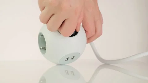 Electricity and technology. Hand pulls out the socket from the extension cord. 스톡 동영상 160037356