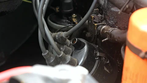 Electricity Arcs From A Loose Spark Plug Wire Stock Footage 306944906