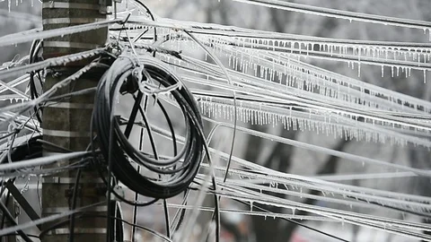 Electricity cables covered in ice after frozen rain phenomenon Video stock 101918606