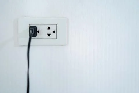 Electricity demand concept The plug in the plug has another space Stock Photos