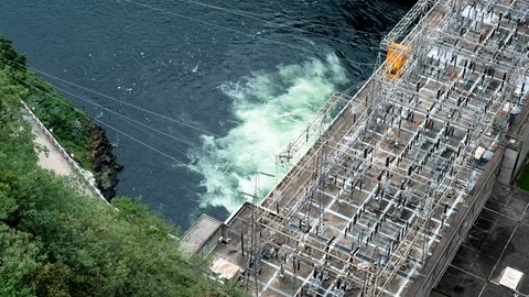 Electricity generating dam working on Stock Footage 100742181