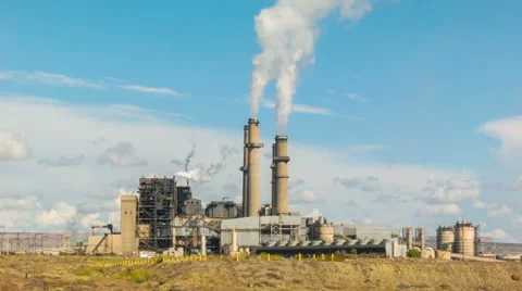 Electricity generating power station with smoke from chimneys Stock Footage 57259286