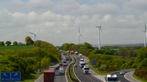 Electricity generating windmills by m18 motorway sheffield uk Stock Footage 49986352