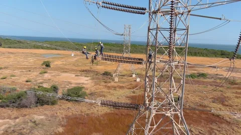Electricity grid maintenance work utility energy sector rural high tension Stock Footage 341098136