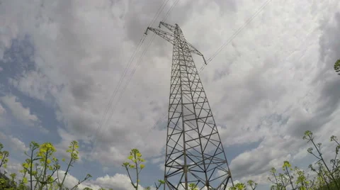 Electricity high voltage tower construction and evening clouds. Timelapse 4k Stock Footage 50347102