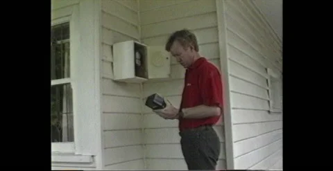 ELECTRICITY METER READER (1988) Stock-Footage 240079585