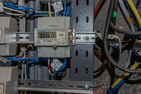Electricity meters. Electrical panel. Electrical wires. Stock Photos