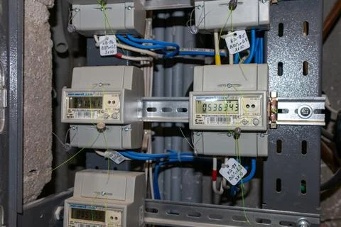 Electricity meters. Electrical panel. Electrical wires. Stock Photos
