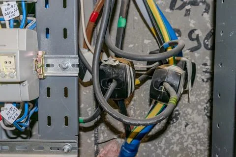 Electricity meters. Electrical panel. Electrical wires. Stock Photos