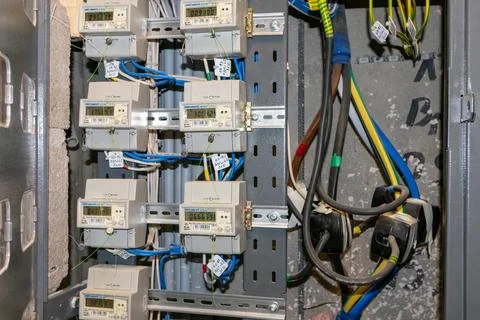Electricity meters. Electrical panel. Electrical wires. Stock Photos