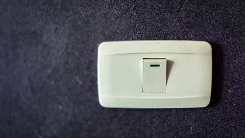 Electricity plug on the wall background Stock Photos