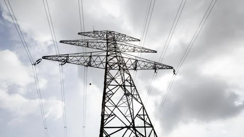 Electricity plyon with passing clouds Stock Footage 317374487