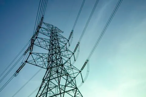 Electricity pole with silhouette sunset sky, Electricity pylon with shadow of Stock Photos