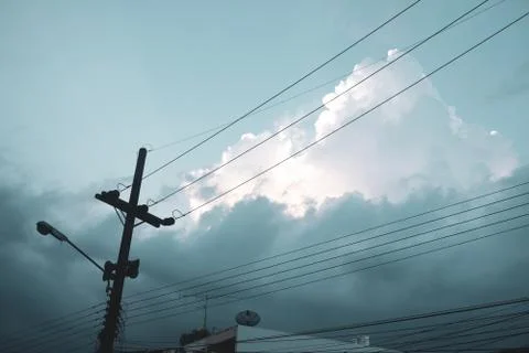 Electricity post and cloudy sky Fotos Stock