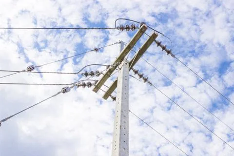 Electricity post in blue sky background Stock Photos