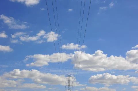 Electricity post on blue sky cloud background Stock Photos