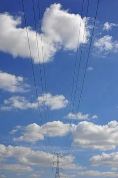 Electricity post on blue sky cloud background Stock Photos