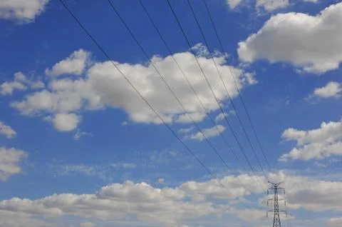Electricity post on blue sky cloud background Stock Photos