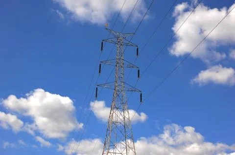 Electricity post on blue sky cloud background Stock Photos