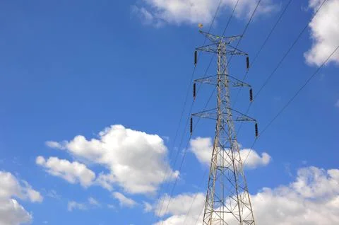 Electricity post on blue sky cloud background Stock Photos