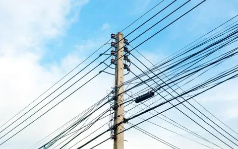 Electricity post in cloud and blue sky background Stock Photos