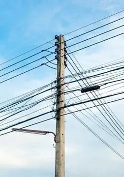 Electricity post in cloud and blue sky background Stock Photos
