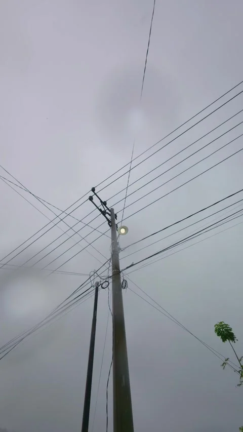 Electricity post on the street in rain weather Stock Footage 300172753