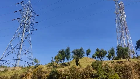 Electricity Power Lines &amp; Tower In An Indian Village Stock Footage 303259835