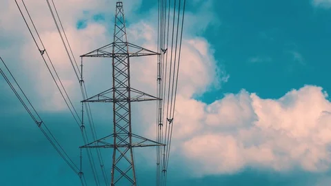 Electricity power pole with clouds timelapse Stock Footage 128506820