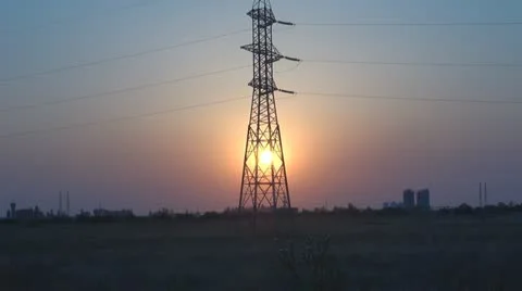 Electricity pylon at sunset. Time Lapse Vídeos de archivo 11887297
