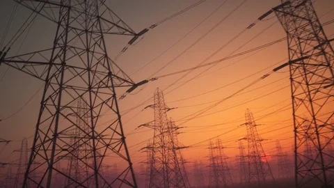 Electricity pylons during sunset Video stock 77342465