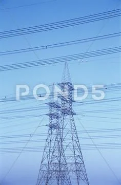 Electricity pylons Stock Photos