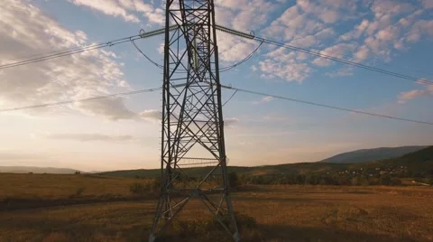Electricity pylons at sunset Stock Footage 68186921
