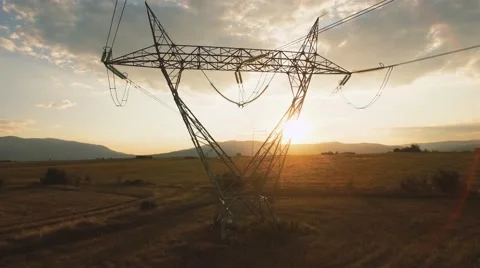 Electricity pylons at sunset Stock Footage 68186942