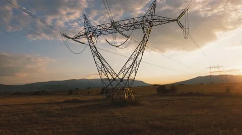 Electricity pylons at sunset Stock Footage 68186983