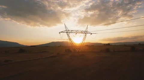 Electricity pylons at sunset Stock Footage 68187023