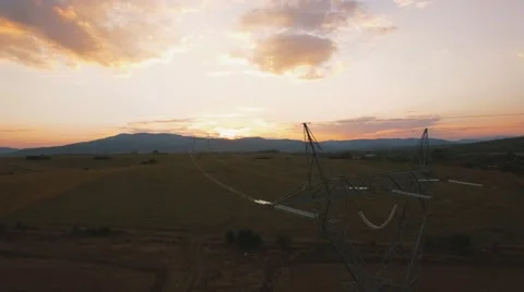 Electricity pylons at sunset Stock Footage 68187027