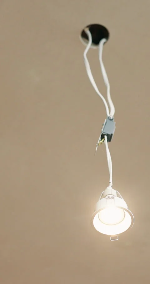 Electricity, remodeling and cable with lightbulb in house for home renovation Stock Footage 340881605
