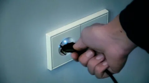 Electricity shock from a wall socket Video stock 70848676