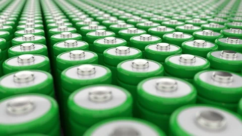 Electricity storage concept. Big field of green AAA batteries. Green energy Stock Footage 103042782