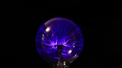 Electricity from a tesla coil based violet wand jumps to a medical device. Stock Footage 46941138
