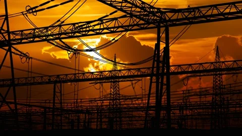 Electricity: Time Lapse at Sunset with  Red Sun,  Fiery Sky and Power Station Stock Footage 145834780