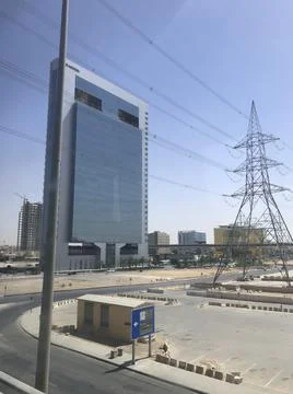 The electricity tower front of the building Stock Photos