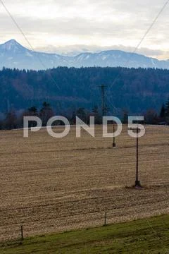 Electricity towers in an austrian landscape Stock Photos