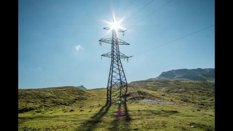Electricity Transmission Tower Under Bright Sunlight Stock Footage 303901296