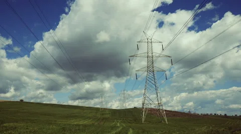 Electricity,high voltage pylons,power transmission lines in the countryside Stock Footage 48991153