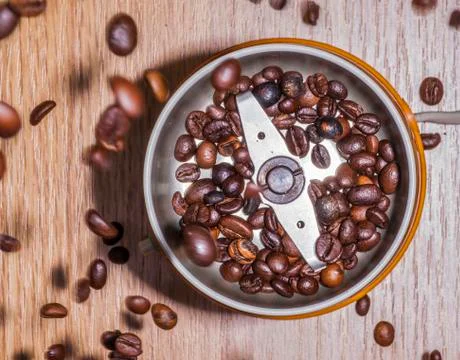Electrict coffee grinder with coffee beans Stock Photos