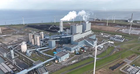 Electricty generation facility. Aerial drone overhead view. Smokestack, wind Stock Footage 229768144
