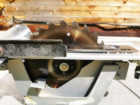 Electrified circular saw installed on the table. Tool for sawing lumber Stock Photos
