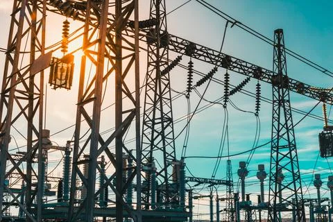 Electrifying Technology A 4K View of High Voltage Lines Stock Photos